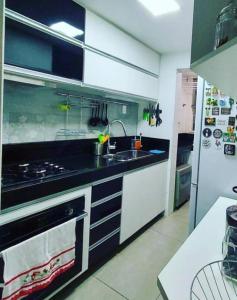 Kjøkken eller kjøkkenkrok på Lazer completo com Vistas de um Belo Horizonte