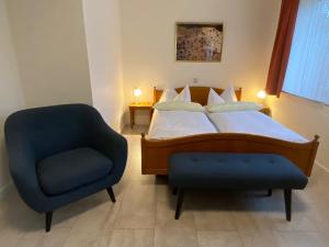 Postel nebo postele na pokoji v ubytování Hotel Janssen