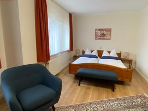 Postel nebo postele na pokoji v ubytování Hotel Janssen