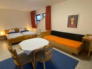 Postel nebo postele na pokoji v ubytování Hotel Janssen