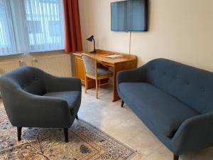 Posezení v ubytování Hotel Janssen