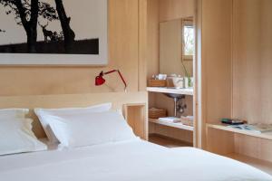 Postel nebo postele na pokoji v ubytování Oasyhotel