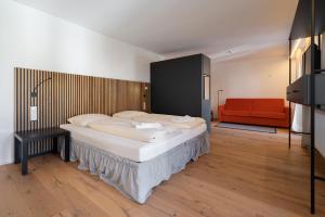 Voodi või voodid majutusasutuse Appartements zur Sonne toas