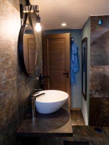 A bathroom at THOMAS SEA VIEW
