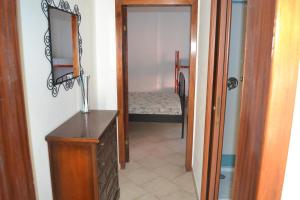 A bed or beds in a room at Appartamento 2m Még 2 kép