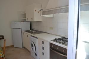 A kitchen or kitchenette at Appartamento 2m