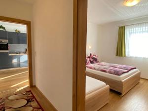 Postel nebo postele na pokoji v ubytování Apartment Schöser - MHO779 by Interhome