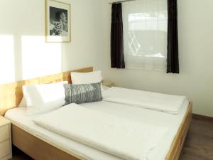 Posteľ alebo postele v izbe v ubytovaní Apartment Hanser by Interhome