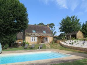 The swimming pool at or near Holiday Home Les Mazaux - LCX200