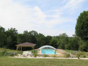 The swimming pool at or near Holiday Home Les Mazaux - LCX200