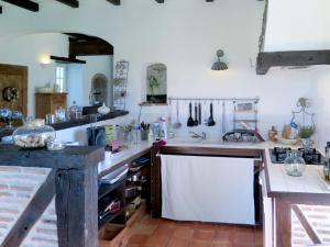 a kitchen with a sink and a counter top at Holiday Home Bouvignou - PDG301 by Interhome in Penne-dʼAgenais