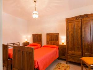 Postel nebo postele na pokoji v ubytování Holiday Home Il Frantoio by Interhome