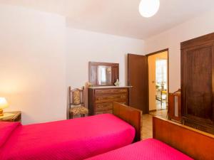 Postel nebo postele na pokoji v ubytování Holiday Home Il Frantoio by Interhome