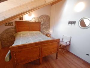 Postel nebo postele na pokoji v ubytování Apartment Albergo Diffuso - Cjasa Ustin-1 by Interhome