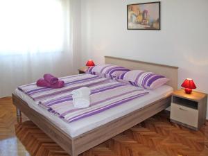 Postel nebo postele na pokoji v ubytování Apartment Luka by Interhome