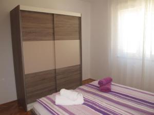 Postel nebo postele na pokoji v ubytování Apartment Luka by Interhome