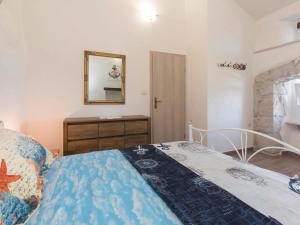 Postel nebo postele na pokoji v ubytování Holiday Home San Martino II by Interhome