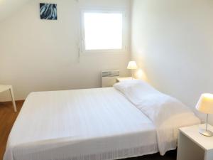 Postel nebo postele na pokoji v ubytování Apartment Résidence Belle Dune-3 by Interhome