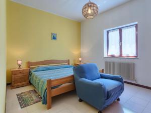 Postel nebo postele na pokoji v ubytování Holiday Home Licia by Interhome