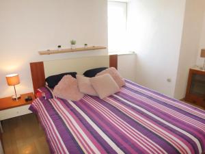 Posteľ alebo postele v izbe v ubytovaní Holiday Home Gojko by Interhome