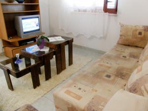 TV a/nebo společenská místnost v ubytování Apartment Margita by Interhome