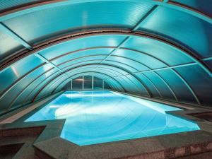 an overhead view of a pool in a tunnel at Holiday Home Sonnleiten-1 by Interhome in Schlierbach