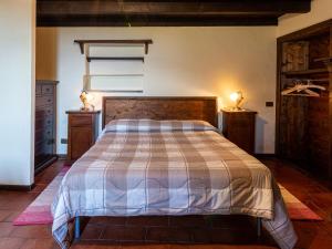 מיטה או מיטות בחדר ב-Apartment Arte e Cucina-2 by Interhome