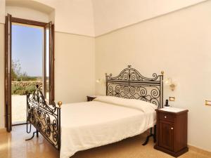 Krevet ili kreveti u jedinici u okviru objekta Villa Tenuta Nucci by Interhome