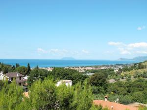 a view of a town with the ocean in the background at Apartment Costa di Kair ed Din-1 by Interhome in Sperlonga