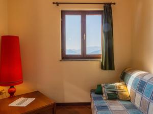 Apartment Arte e Cucina-1 by Interhome tesisinde bir odada yatak veya yataklar