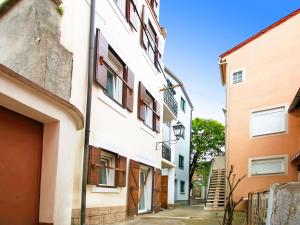 Budova, v ktorej sa apartmán nachádza + 15 fotografií