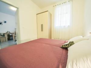 Posteľ alebo postele v izbe v ubytovaní Apartment Snježana-2 by Interhome