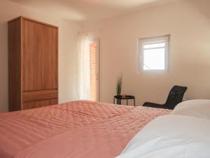Postel nebo postele na pokoji v ubytování Apartment Gordana-1 by Interhome