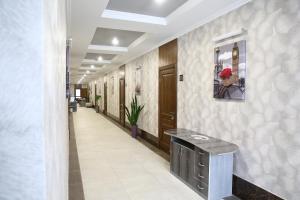a corridor of a hospital with a hallway sidx sidx sidx at Львівський in Lviv +74 photos