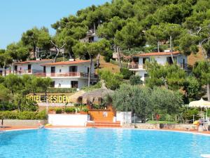 a view of the swimming pool at a resort at Apartment Costa di Kair ed Din-6 by Interhome in Sperlonga