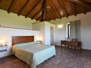 Holiday Home La Corte Bricca - Trilo Torretta by Interhome tesisinde bir odada yatak veya yataklar