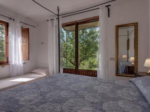 Posteľ alebo postele v izbe v ubytovaní Apartment Le Sodole - Papavero by Interhome