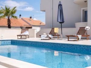 Bazén v ubytovaní Apartment Villa 2 Pools-5 by Interhome alebo v jeho blízkosti