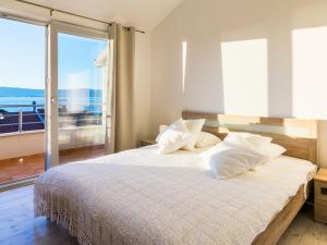 Posteľ alebo postele v izbe v ubytovaní Apartment Villa 2 Pools-5 by Interhome