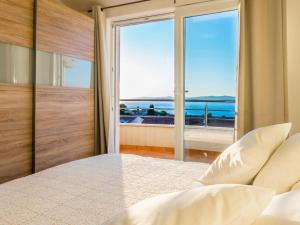 Posteľ alebo postele v izbe v ubytovaní Apartment Villa 2 Pools-5 by Interhome