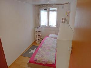Postel nebo postele na pokoji v ubytování Apartment Marilyn by Interhome