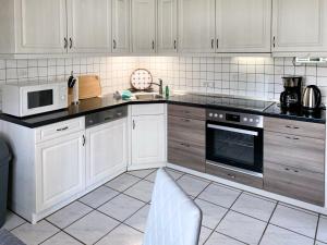 Dapur atau dapur kecil di Apartment Hahnkamper Hof by Interhome