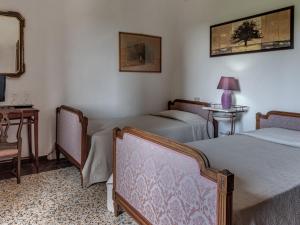 Posteľ alebo postele v izbe v ubytovaní Apartment Le Sodole - Petunia by Interhome