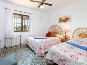 Posteľ alebo postele v izbe v ubytovaní Holiday Home El Zapo by Interhome