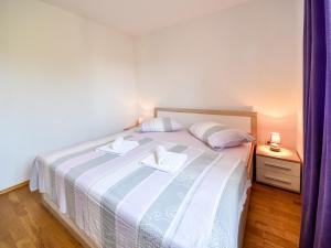 Postel nebo postele na pokoji v ubytování Apartment Milin-2 by Interhome