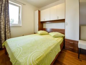 Postel nebo postele na pokoji v ubytování Apartment Milin-2 by Interhome