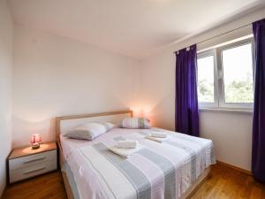Postel nebo postele na pokoji v ubytování Apartment Milin-2 by Interhome