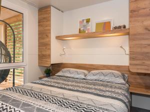 Posteľ alebo postele v izbe v ubytovaní Holiday Home Klen 1 by Interhome