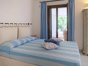 Posteľ alebo postele v izbe v ubytovaní Holiday Home Omer by Interhome