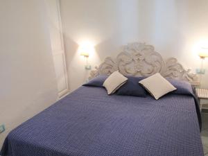 Posteľ alebo postele v izbe v ubytovaní Holiday Home Omer by Interhome